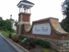 River Park Entrance ~ Great Master Planned Community with Homes, Town Homes, Club House, Swim, Tennis, Fitness Center, Club House, Commercial & More! Great Location close to I-575, Schools, Shopping & Restaurants!