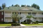 Low rise 2 story building in the Community located on River Oaks Golf Course