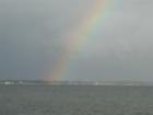 Rainbow in the west, cloudy day, pot of gold still at large.