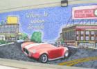 A mural in downtown Ferndale on a storefront along 9 mile welcoming you to Ferndale