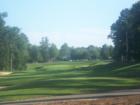 View of the Devils Ridge clubhouse from the 18th Tee Box.