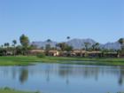 Looking north from McCormick Ranch Pkwy accross lake to Sante Fe subdivision. McDowell Mountains in the distance. 