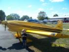 My grandson in front of one of the planes on display at Pottstown Airport's Community Day.