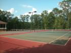 Two lighted tennis courts are available to all home owners.