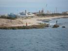Fishing at the mouth of the harbor