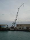 Large crane gets a lot of work at the harbor