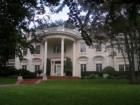 Highland Park - Stunning Neoclassical home located on Lakeside Drive across from Exall Lake. This small lake is perfect for a picnic lunch or to feed the many ducks.