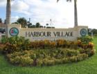 Sign at the entrance to Harbour Village. I love the landscaping. And this is a great community! 