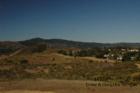 The view of Crystal Springs Resevoir & 280 from the open space trrack field behind Hallmark Park.