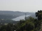 View of Lake Austin from Courtyard area with Austin downtown skyline in the distance - west Austin