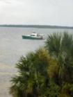 boat resting on the serene waters of East Bay in the Parker area of Panama City