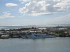 Coast Guard Cutter parked by Sand Island