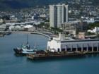 Barge and tugs in Honolulu Harbor