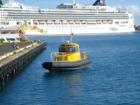 Harbor Pilot comes in to tie up at Aloha Tower