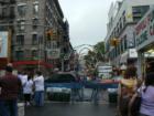 Feast of San Gennaro, Little Italy, New York City, 2007.  The rain is starting to let up.
      By Feng Shui Long Island, New  York City