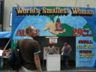 One of the "attractions" at The Feast of San Gennaro, 2007.  In tiny letters it says "illusion"
      By Feng Shui Long Island, New York City