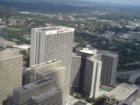 Mariott Marquis Hotel/Office Complex and the Atlanta Hilton in Atlanta Georgia viewed from the Sundial Restaurant atop the Westin Peachtree Plaza. Teresa Johnson and Associates; REMAX Greater Atlanta; www.AtlantaHomeStore.com; 770-888-0021