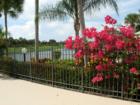 Look closely just past the beautiful flowers by the Pool and you will see the Lake that The Lakes at the BLUFFs was named after.