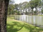 Lake with fountain and walking trail at Spring Lakes in Spring TX