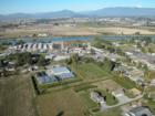 Photo of Mount Vernon, the Skagit River and Mountains in the distance taken by Ryan Martin from helicopter.