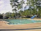 In the summertime, kids and adults alike hang out at the Cypresswood community pool in Spring TX