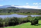 view of Haleakala with Haiku reservoir in foreground