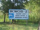 BCWCID #2 offices are in Tahitian Village.  They provide water and sewer to the lots if possible.