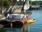 A replica gundalow to the ones that moved goods and trade along the river system from Portsmouth, NH Located at Prescott Park during the summer months.