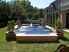 Highland Park - Gorgeous raised water feature in a 1920's Hal Thompson designed home on Beverly Drive. 