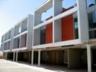 Automobile carports and exterior view of Tempe Urban Living (TUL), Tempe, AZ