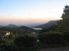 Smoke From East San Diego County Fires is Blown by Santa Ana Winds into the Hills Surrounding Escondido's Lake Hodges