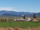 View of Mount Vernon and La Conner farmlands and ridge in Mount Vernon, WA. Photo taken by Ryan Martin.