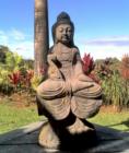 tranquil setting in Haiku for a diety statue