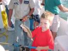 Catching fish on the Island Queen