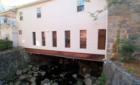 Building spanning the Tiber River
