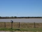 Taken from 304 this is a great example of a "tank" that has caught and held rainwater on a large ranch in Central Texas