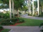 The common grounds in the Three Lakes community are lushly landscaped