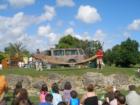 Here they are displaying the skin of the biggest snake they ever came in contact with.  Glad it was them and not me =)