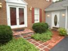 Handsome mason-work enhance the front entrance of this Lutherville Timonium colonial.
