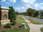 One of the three parks in Trilogy Park.  Summertime Park has a large field where many of the kids play football and other games.