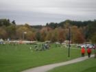 This is a view of the kids playing soccer and parents watching at the community park in West Goshen.