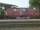 A railroad car for tourism across from the Manassas Rail Station