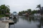 View down the canal of a home located in the south east section of Cape Coral