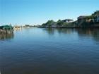 View down the Gulf Access canal heading toward the river