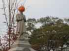 A pumpkin on the monument in downtown Chester at Halloween 2007