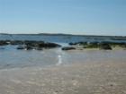 The beach on the Merrimack River at Salisbury Beach State Reservation.