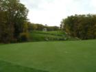 Looking back at the 13th fairway from behind the 13th green at Atkinson Resort and Country Club. This is a real tricky green, you do not want your ball above the hole at all.