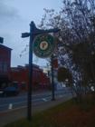 Historical signs are positioned throughout downtown Apex.
