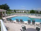 Our club facilities and grounds include an inviting re-modeled 15,000 square foot clubhouse, 4 tennis courts, resort-style pool. Eat a marvelous meal in our dining room with year-round service