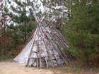 Hand-peeled poles and birch bark make up this authentic Native American dwelling.